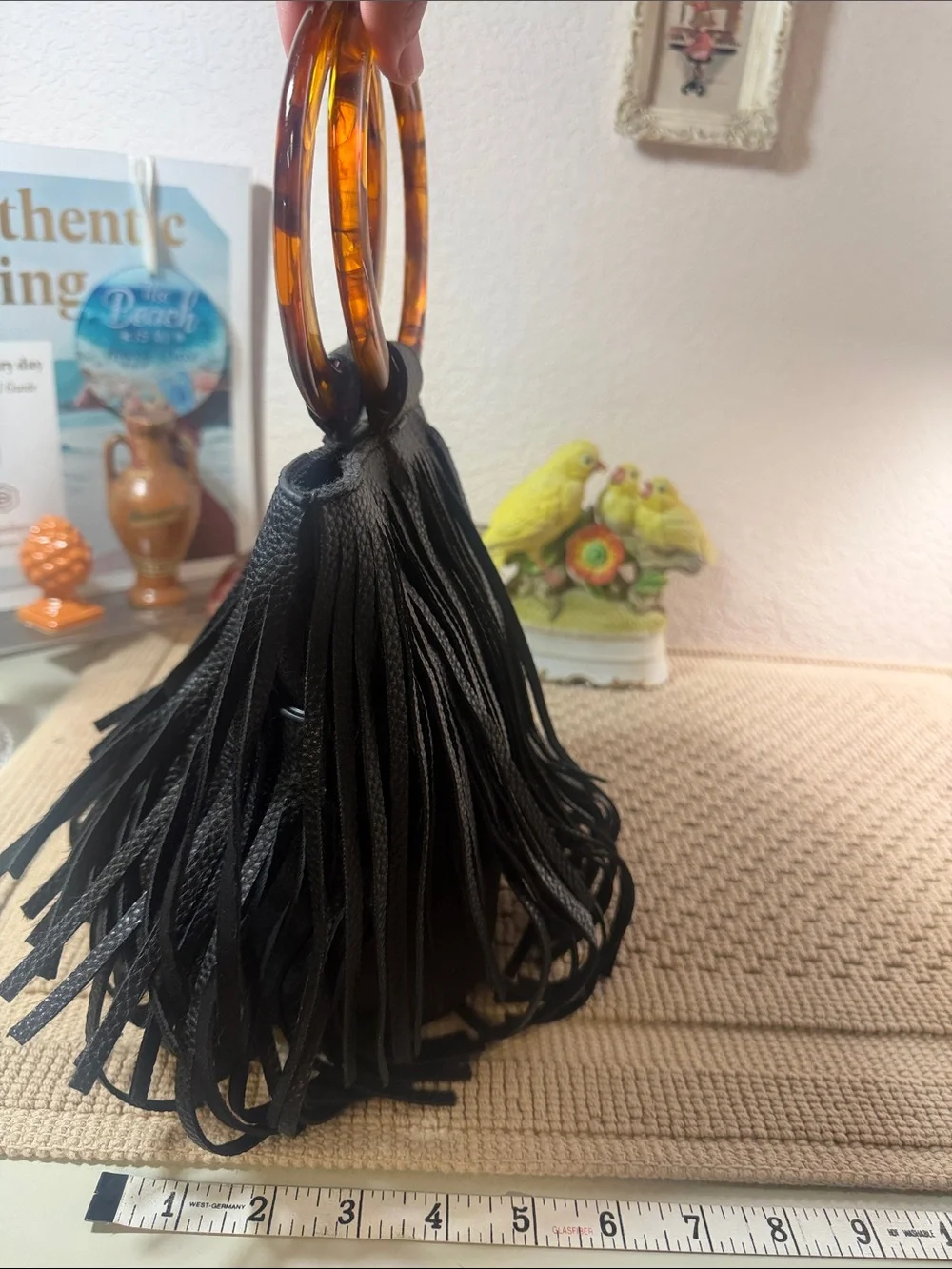 Black Fringed Wristlet with Amber Acrylic Ring Handle